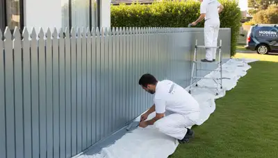 Fence painting service in Colorado Springs, CO for durable curb appeal and weather protection